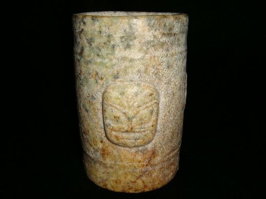 Hongshan Jade tube shaped object with 3 figure heads  