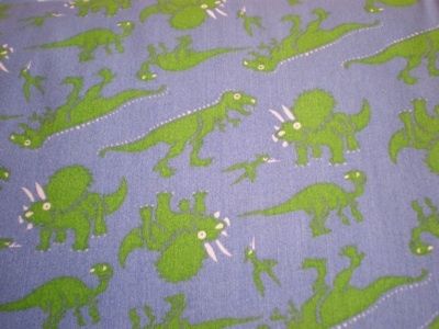 GREEN DINOSAUR BLUE BACKGROUND COTTON QUILT FABRIC BTY  