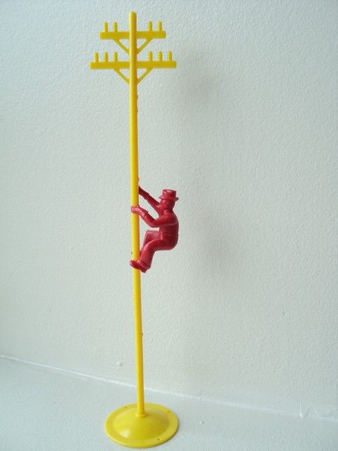 Man climbing pole telephone plastic toy vintage retro collectible 