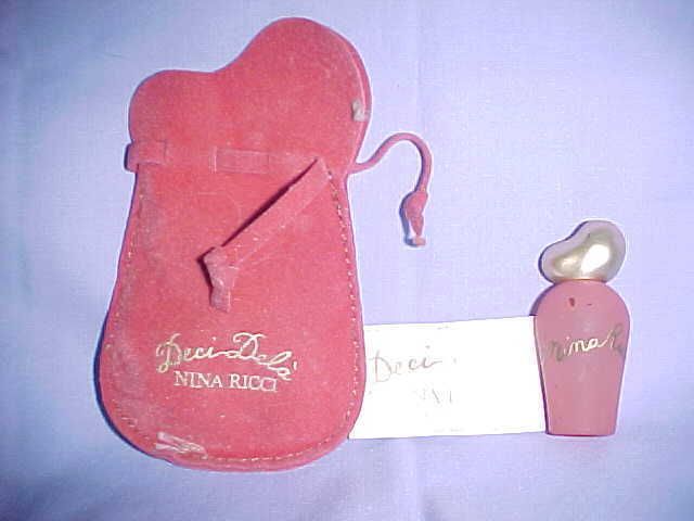 FULL MINI BOTTLE DECI DELA EAU DE TOILETTE CONCENTRATE NINA RICCI 