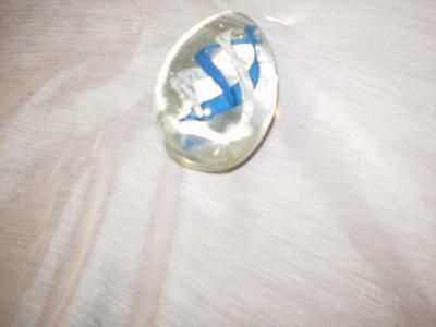 Description Art Glass, glass, blue and white swirl, egg shaped 