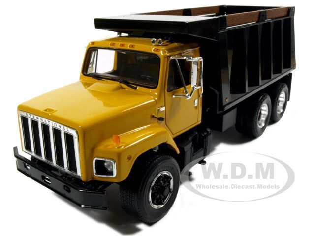 INTERNATIONAL S SERIES DUMP TRUCK YELLOW 125  