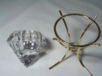 This is a 24% lead crystal   diamond shaped votive. Made in Germany by 