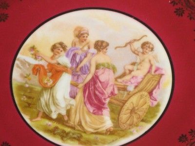   OF TWELVE GERMAN PORCELAIN PLATES WITH A MAKERS MARK OF A GOLD BEEHIVE