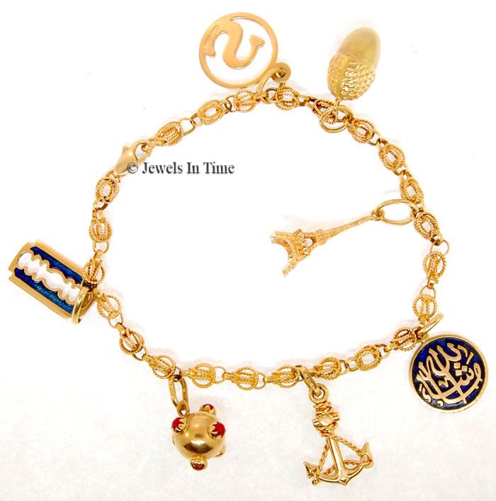 Charm Bracelet 18k Gold 7 Charms 8 Inch  